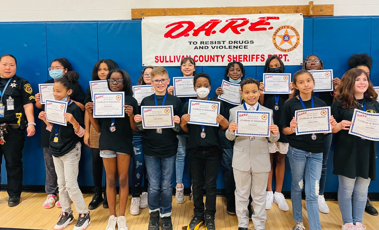 Rutherford School DARE graduates and essay writers are with Cpl. Rose Ionta from the county Sheriff's Department.